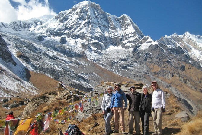 Annapurna Sanctuary Trek - 14 Days - Ghorepani and Poon Hill: sunrise views, early mornings, and rhododendron relief