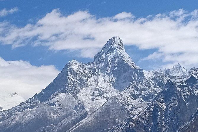 Everest Base Camp Trekking 16 Days - Dingboche and Lobuche: fields behind stone walls and memorial prayer flags