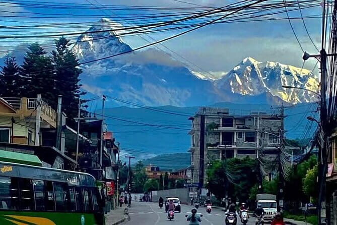 Full day Suspension Bridge, Boating, George, Sightseeing Tour - Entering Pokhara: waterfalls, caves, temples, and a lake loop